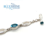 Sterling Silver Bracelet with Oval Cut Blue Topaz - 8"